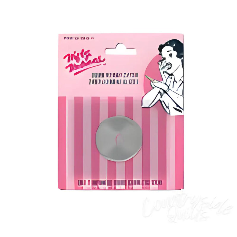 Round silver metal button on pink striped packaging for 28MM Rotary Repl Blades