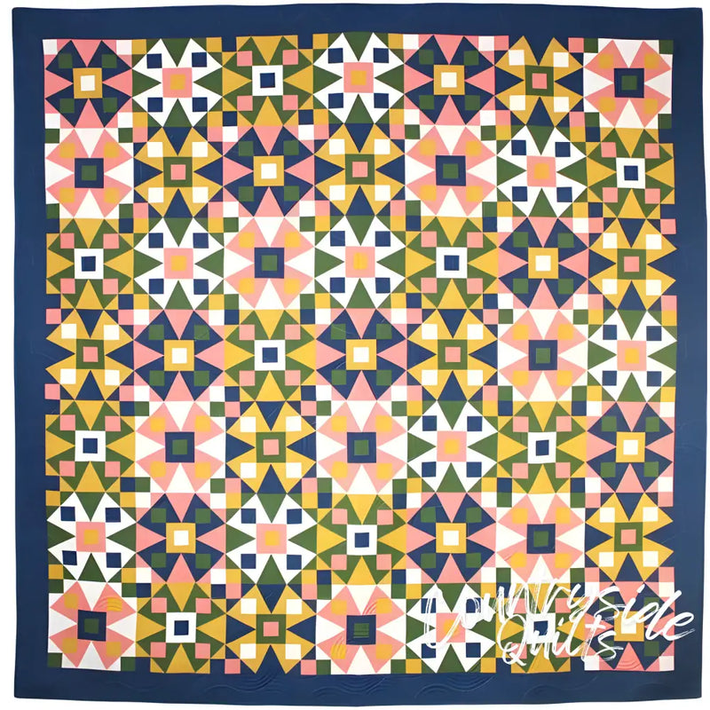 Geometric quilt with star motifs in pink, green, navy from Art East Quilting Co Propeller Quilt Pattern