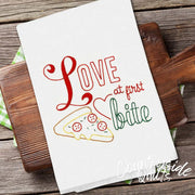 White kitchen towel with red Love at First Bite text and pizza design for Aunt Martha’s All-American Treats