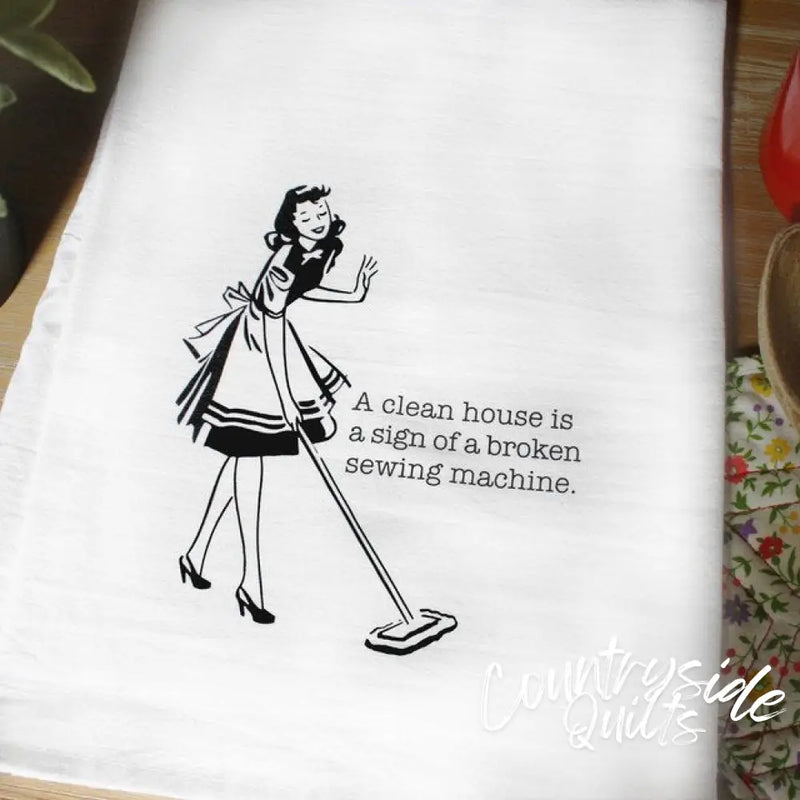 Retro-style tea towel featuring Aunt Martha’s Dirty Laundry design and humor about a broken sewing machine