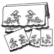 Decorative pillowcases with embroidered butterflies in Aunt Martha’s® Pretty Bedroom Set
