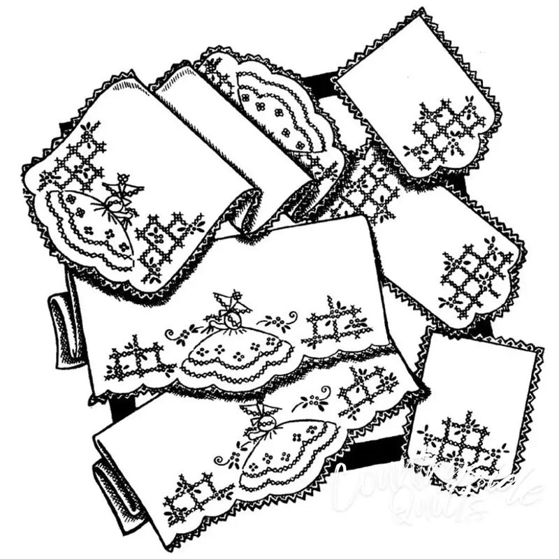 Decorative pillowcases with embroidered lace patterns and scalloped edges featuring Colonial Girl Motifs from Aunt Marthas® for countryside quilts