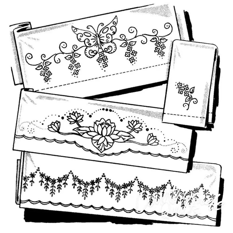 Embroidered linens with floral motifs from Aunt Martha’s® Butterfly & Floral collection