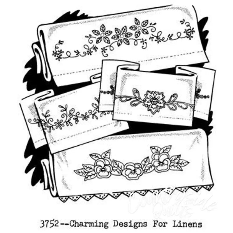 Embroidered linen designs from Aunt Marthas® showcasing charming countryside quilts