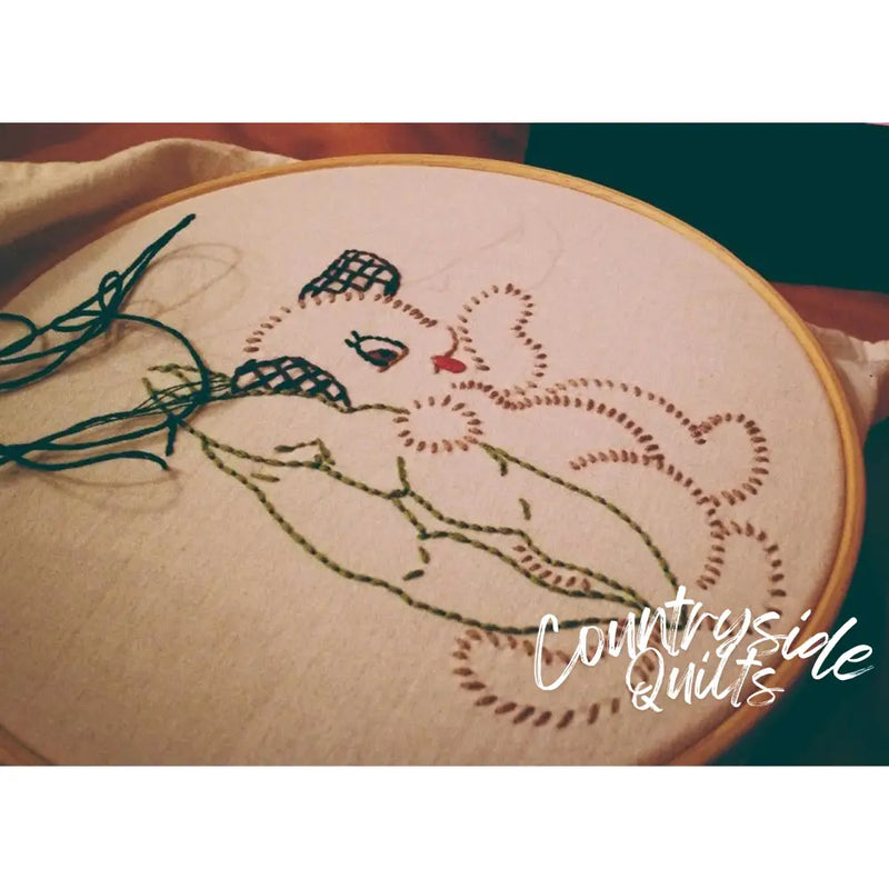 Embroidered bunny in hoop from Aunt Martha’s® countryside quilts veggie pup collection