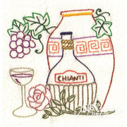 Embroidered wine still life on Aunt Martha’s® Wine Country countryside quilt