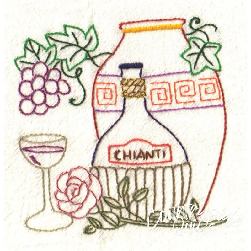 Embroidered wine still life on Aunt Martha’s® Wine Country countryside quilt