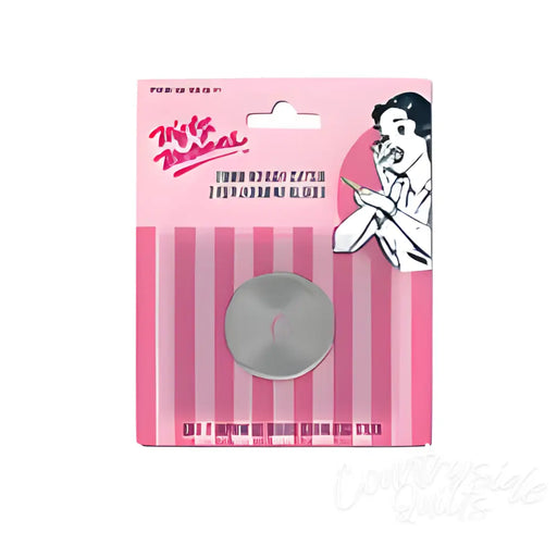 Round silver metal button on pink striped packaging for 28MM Rotary Repl Blades