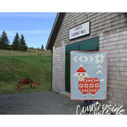 Quilt block pattern with red-roofed barn in Art East Quilting Ewe Quilt Pattern design