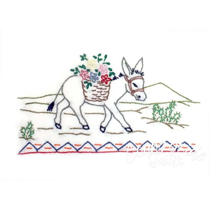Donkey with flower basket in Aunt Martha’s 3853 Southwest for quilting projects