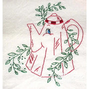 Red embroidered teapot surrounded by green leaves from Aunt Martha’s animated crockery