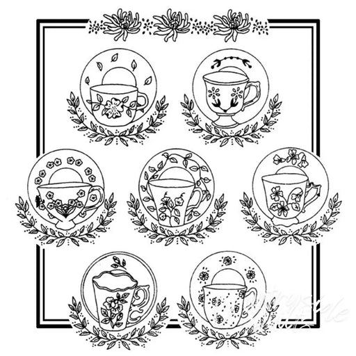 Collection of Aunt Martha’s floral teacups and teapots surrounded by laurel wreaths