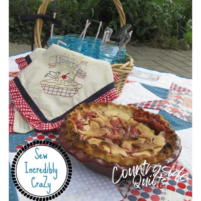 Aunt Martha’s #4022 pie showcases a lattice crust on a red checkered cloth, perfect for quilting