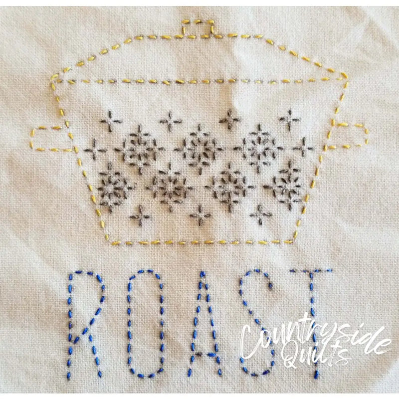 Embroidered casserole dish showcasing Sashiko Japanese embroidery with snowflake patterns