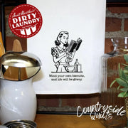 Retro wall art depicting Aunt Martha’s Dirty Laundry featuring the phrase Mind Your Own Biscuits and Life Will Be Gravy