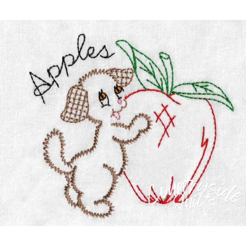 Embroidered veggie pup hugging an apple on Aunt Marthas countryside quilts fabric