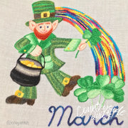 Embroidered leprechaun with rainbow and pot of gold on Aunt Martha’s® Monthly Madness quilt