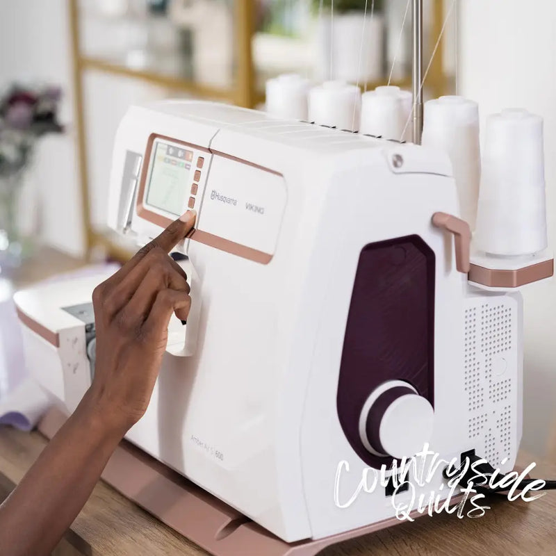 HUSQVARNA® VIKING® AMBER™ Air S | 600 Coverlock Machine