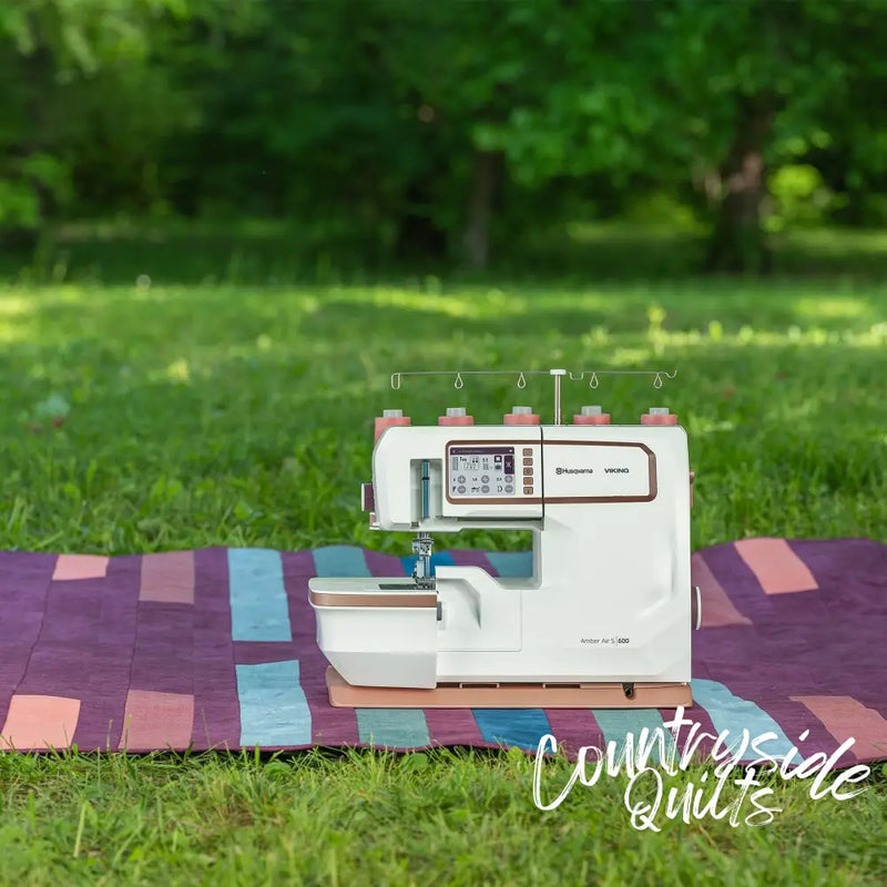 HUSQVARNA® VIKING® AMBER™ Air S | 600 Coverlock Machine
